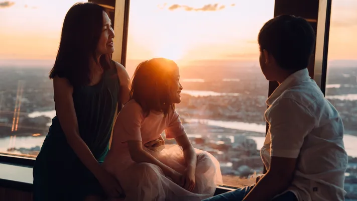 Guests watching the sunset from the Observation Deck
