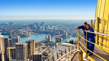People on SKYWALK tour pointing